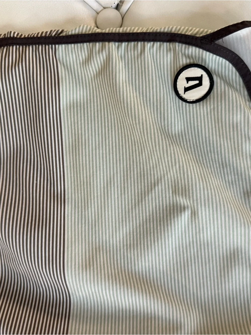 Vuori Men's Pinstripe Swim Board Shorts in Light Gray and Brown Trim